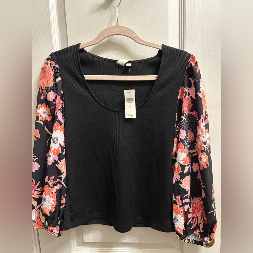 Dolan from Anthropologie black knit top witn 
Chiffon sleeves